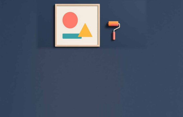 Flat illustration of a framed white poster with colorful shapes on a navy blue wall